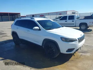 2019 Jeep Cherokee Latitude with VIN 1C4PJLCB1KD439150, listed as a IAAI auction lot 41660840 with 122,744 mi miles. Bid and sale history available at carsss.com. Image 1.