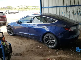 2018 Tesla Model 3 Long Range Battery z VIN 5YJ3E1EB3JF134664, wystawiony jako Copart lot #57288485 z przebiegiem Nie podano mil oraz Szkoda całkowita • Salvage title. Historia ofert i sprzedaży dostępna na DreamBid. Obrazek 2.