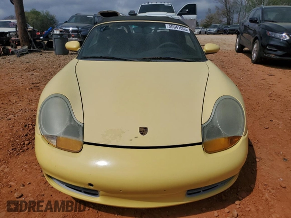 1998 Porsche Boxster с VIN WP0CA2982WU623104, выставлен на аукционе Copart как лот 50941005 с пробегом 78 486 миль миль и Чистый • Clean title. История ставок и продаж доступна на DreamBid. Изображение 5.