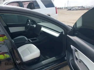 2021 Tesla Model 3 Performance with VIN 5YJ3E1EC5MF919278, listed as a IAAI auction lot 40194677 with 50,484 mi miles and . Bid and sale history available at carsss.com. Image 5.