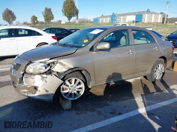 2009 Toyota Corolla with VIN 1NXBU40E59Z164488, listed as a IAAI auction lot 40907058 with 180,161 mi miles. Bid and sale history available at carsss.com. Image 2.
