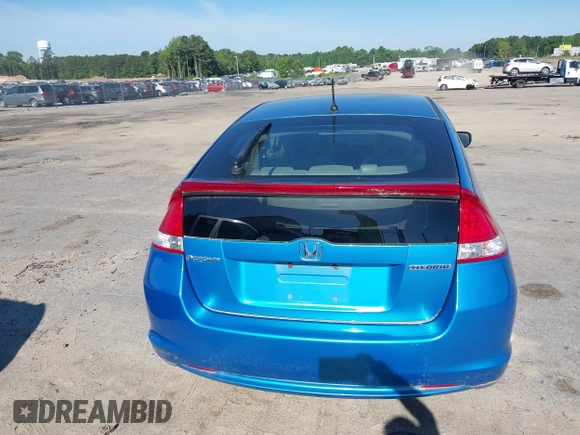 2010 Honda Insight EX with VIN JHMZE2H74AS013148, listed as a IAAI auction lot 42194894 with 114,885 mi miles and . Bid and sale history available at DreamBid. Image 15.