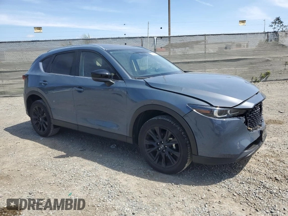 2023 Mazda CX-5 2.5 S Carbon Edition with VIN JM3KFBCM0P0256626, listed as a Copart auction lot 50818685 with 13,338 mi miles and Salvage Title. Bid and sale history available at carsss.com. Image 4.