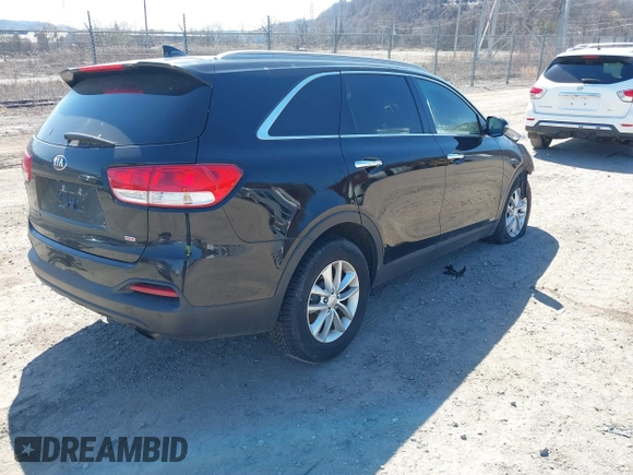 2016 Kia Sorento LX with VIN 5XYPGDA35GG055431, listed as a IAAI auction lot 41821606 with 141,011 mi miles. Bid and sale history available at carsss.com. Image 4.
