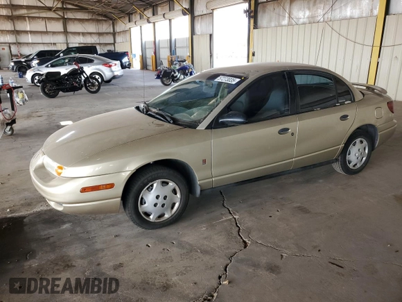 2002 Saturn SL z VIN 1G8ZH52842Z165459, wystawiony jako Copart lot #57273035 z przebiegiem 84 482 mil mil oraz Szkoda całkowita • Salvage title. Historia ofert i sprzedaży dostępna na DreamBid. Obrazek 1.