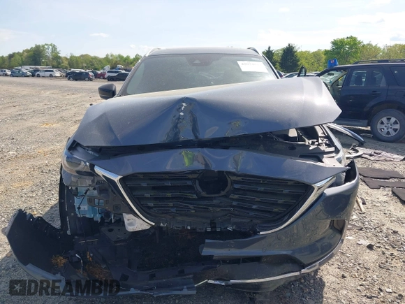 2022 Mazda CX-9 Grand Touring with VIN JM3TCBDY8N0628886, listed as a IAAI auction lot 42074044 with 67,867 mi miles and . Bid and sale history available at DreamBid. Image 13.
