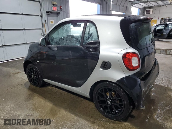 2016 Smart fortwo Passion z VIN WMEFJ5DA9GK067011, wystawiony jako Copart lot #46152325 z przebiegiem 61 195 mil mil oraz Szkody całkowita. Historia ofert i sprzedaży dostępna na DreamBid. Obrazek 2.