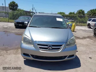 2006 Honda Odyssey EX-L with VIN 5FNRL38776B098021, listed as a IAAI auction lot 42036487 with 176,043 mi miles. Bid and sale history available at carsss.com. Image 6.