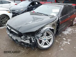 2015 BMW 6 Series 640i with VIN WBA6A0C55FGB53603, listed as a IAAI auction lot 41543996 with 71,046 mi miles and . Bid and sale history available at DreamBid. Image 6.