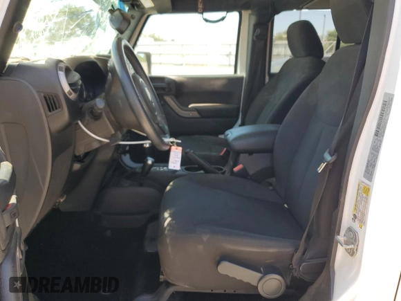 2016 Jeep Wrangler Unlimited Sport with VIN 1C4BJWDG0GL309976, listed as a Copart auction lot 63340505 with 66,714 mi miles and Salvage title. Bid and sale history available at DreamBid. Image 7.
