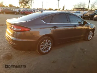 2019 Ford Fusion Hybrid SE with VIN 3FA6P0LU9KR108064, listed as a Copart auction lot 67453752 with 96,227 mi miles. Bid and sale history available at carsss.com. Image 3.