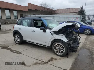 2015 MINI Countryman S with VIN WMWZC5C54FWP45274, listed as a Copart auction lot 47877695 with Not Provided miles and Salvage Title. Bid and sale history available at DreamBid. Image 4.