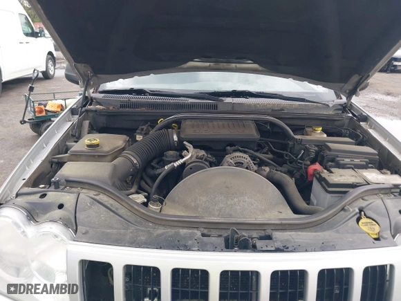 2005 Jeep Grand Cherokee Laredo with VIN 1J4GS48K75C644259, listed as a IAAI auction lot 42044878 with 250,841 mi miles. Bid and sale history available at carsss.com. Image 10.