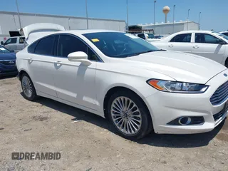 2014 Ford Fusion Titanium с VIN 3FA6P0K97ER390562, выставлен на аукционе IAAI как лот 42255424 с пробегом 122 016 миль миль и . История ставок и продаж доступна на DreamBid. Изображение 1.