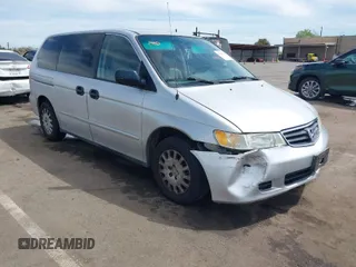 2002 Honda Odyssey LX z VIN 2HKRL18502H564032, wystawiony jako IAAI lot #42023843 z przebiegiem 191 507 mil mil oraz . Historia ofert i sprzedaży dostępna na DreamBid. Obrazek 1.