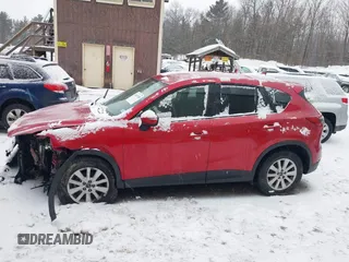2016 Mazda CX-5 Touring with VIN JM3KE2CY3G0651194, listed as a IAAI auction lot 41657288 with 1 mi miles. Bid and sale history available at carsss.com. Image 13.
