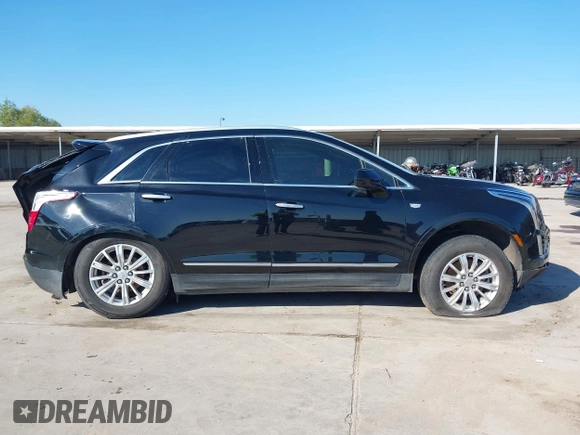 2019 Cadillac XT5 FWD with VIN 1GYKNARS7KZ117913, listed as a IAAI auction lot 41228767 with 105,335 mi miles and . Bid and sale history available at carsss.com. Image 13.