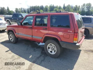 1999 Jeep Cherokee Sport z VIN 1J4FF68SXXL525944, wystawiony jako Copart lot #57653905 z przebiegiem 102 057 mil mil oraz Szkoda całkowita • Salvage title. Historia ofert i sprzedaży dostępna na DreamBid. Obrazek 2.