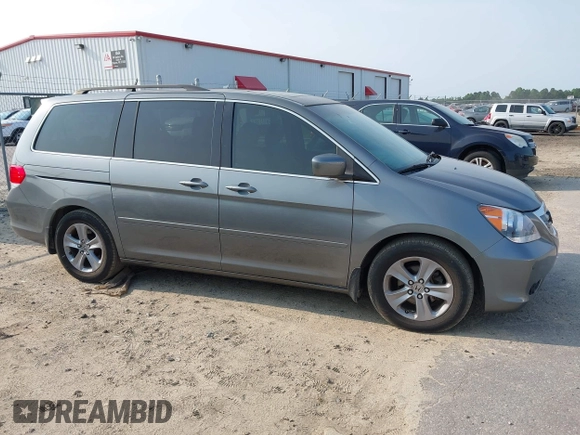 2008 Honda Odyssey Touring z VIN 5FNRL38978B047803, wystawiony jako IAAI lot #42427855 z przebiegiem 125 697 mil mil oraz . Historia ofert i sprzedaży dostępna na DreamBid. Obrazek 14.
