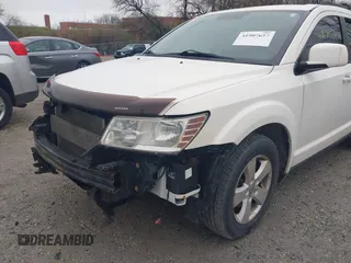2012 Dodge Journey SXT with VIN 3C4PDCCG6CT132457, listed as a IAAI auction lot 41907657 with 169,160 mi miles and . Bid and sale history available at DreamBid. Image 14.