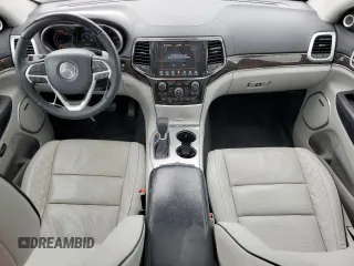 2019 Jeep Grand Cherokee Summit with VIN 1C4RJFJT4KC848996, listed as a Copart auction lot 54974925 with 106,517 mi miles and Salvage title. Bid and sale history available at DreamBid. Image 8.
