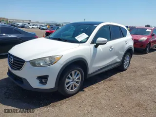 2016 Mazda CX-5 Touring with VIN JM3KE4CY7G0687952, listed as a IAAI auction lot 41976375 with 113,018 mi miles. Bid and sale history available at carsss.com. Image 17.