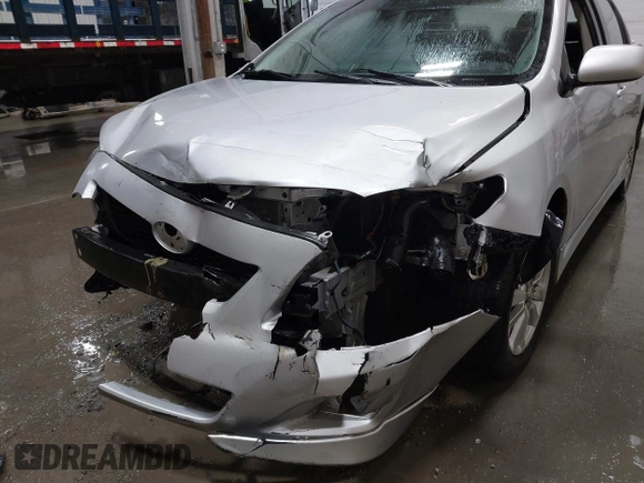 2010 Toyota Corolla with VIN 2T1BU4EE9AC446521, listed as a IAAI auction lot 41986456 with 1 mi miles. Bid and sale history available at carsss.com. Image 6.