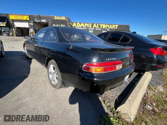 1995 Lexus SC 400 z VIN JT8UZ30CXS0041496, wystawiony jako Copart lot #80837114 z przebiegiem 62 010 mil mil oraz Tytuł czysty. Historia ofert i sprzedaży dostępna na DreamBid. Obrazek 3.