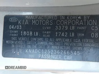 2003 Kia Rio with VIN KNADC125236266545, listed as a IAAI auction lot 41888737 with 114,267 mi miles. Bid and sale history available at carsss.com. Image 9.