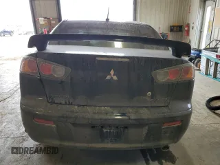 2015 Mitsubishi Lancer SE z VIN JA32V2FW5FU600675, wystawiony jako Copart lot #48720404 z przebiegiem 146 773 mil mil oraz Nie do naprawy • Non repairable. Historia ofert i sprzedaży dostępna na DreamBid. Obrazek 6.
