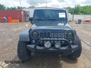 2018 Jeep Wrangler Unlimited Sport S with VIN 1C4BJWDG1JL849635, listed as a IAAI auction lot 42060964 with 60,405 mi miles and . Bid and sale history available at DreamBid. Image 12.
