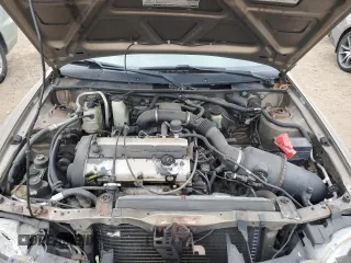 1998 Ford Escort with VIN 3FALP1138WR141453, listed as a Copart auction lot 87408174 with 116,715 mi miles and Salvage title. Bid and sale history available at DreamBid. Image 11.