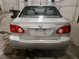 2004 Toyota Corolla CE with VIN 1NXBR38E94Z341018, listed as a Copart auction lot 82170594 with 221,462 mi miles and Non Repairable. Bid and sale history available at DreamBid. Image 6.