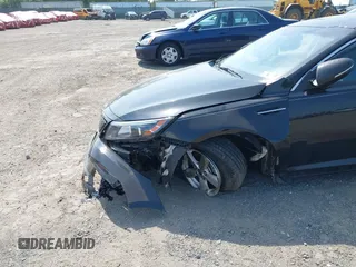 2015 Kia Optima LX with VIN KNAGM4A7XF5653580, listed as a IAAI auction lot 42483072 with 103,589 mi miles and . Bid and sale history available at DreamBid. Image 13.