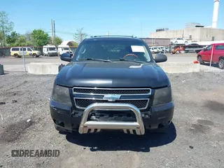 2012 Chevrolet Suburban LT with VIN 1GNSCJE09CR168533, listed as a IAAI auction lot 42142325 with 250,582 mi miles. Bid and sale history available at carsss.com. Image 12.