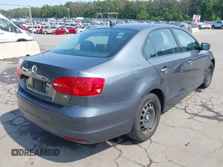 2014 Volkswagen Jetta SE with VIN 3VWD17AJ2EM274963, listed as a IAAI auction lot 42657388 with 138,482 mi miles and . Bid and sale history available at DreamBid. Image 4.