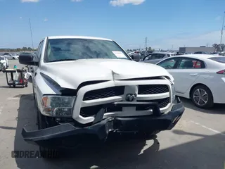 2018 Ram 1500 Tradesman with VIN 1C6RR6FG8JS166266, listed as a IAAI auction lot 42128397 with 76,106 mi miles and . Bid and sale history available at DreamBid. Image 12.