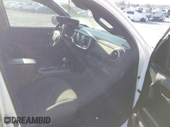 2018 Toyota Tacoma SR5 with VIN 3TMAZ5CN4JM062272, listed as a IAAI auction lot 41671472 with 114,566 mi miles and . Bid and sale history available at DreamBid. Image 5.
