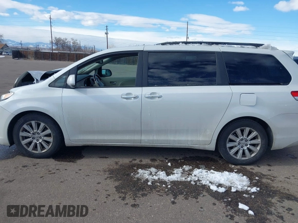 2011 Toyota Sienna XLE AAS with VIN 5TDYK3DC8BS045352, listed as a IAAI auction lot 41401955 with 142,492 mi miles and . Bid and sale history available at DreamBid. Image 14.
