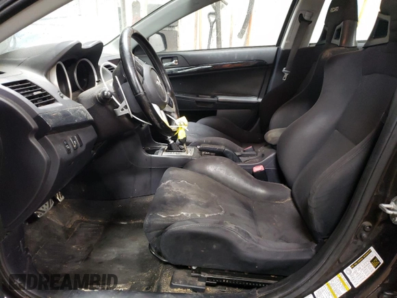 2013 Mitsubishi Lancer Evolution MR z VIN JA32W5FV5DU016540, wystawiony jako Copart lot #47615845 z przebiegiem 79 599 mil mil oraz Szkoda całkowita • Salvage title. Historia ofert i sprzedaży dostępna na DreamBid. Obrazek 7.