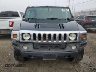 2003 Hummer H2 with VIN 5GRGN23U83H143843, listed as a Copart auction lot 43792915 with 115,569 mi miles and Salvage Title. Bid and sale history available at carsss.com. Image 5.