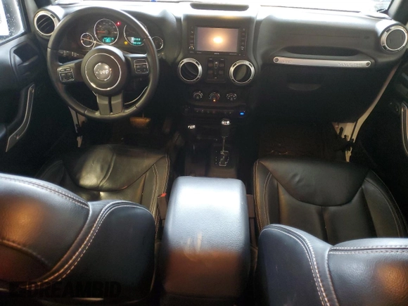 2015 Jeep Wrangler Unlimited Altitude с VIN 1C4HJWEG3FL559879, выставлен на аукционе Copart как лот 61054505 с пробегом 100 123 миль миль и На запчасти • Non repairable. История ставок и продаж доступна на DreamBid. Изображение 8.