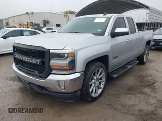 2018 Chevrolet Silverado 1500 LT with VIN 1GCRCREC4JZ287085, listed as a IAAI auction lot 41450057 with 79,275 mi miles and . Bid and sale history available at DreamBid. Image 17.