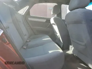 2006 Suzuki Forenza z VIN KL5JD56Z76K402080, wystawiony jako Copart lot #72608244 z przebiegiem 162 183 mil mil oraz Szkody całkowita. Historia ofert i sprzedaży dostępna na DreamBid. Obrazek 10.