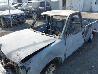 2004 Toyota Tacoma z VIN 5TENL42N14Z328742, wystawiony jako IAAI lot #42474370 z przebiegiem Nie podano mil oraz . Historia ofert i sprzedaży dostępna na DreamBid. Obrazek 6.