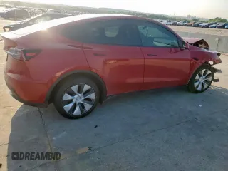 2023 Tesla Model Y Long Range z VIN 7SAYGDEE8PA138780, wystawiony jako Copart lot #53294385 z przebiegiem 137 496 mil mil oraz Szkoda całkowita • Salvage title. Historia ofert i sprzedaży dostępna na DreamBid. Obrazek 3.