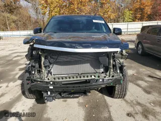 2024 Cadillac Escalade Premium Luxury with VIN 1GYS4BKL1RR181502, listed as a Copart auction lot 77155704 with 6,588 mi miles and Salvage Title. Bid and sale history available at carsss.com. Image 5.