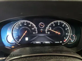 2018 BMW 5 Series 540i xDrive with VIN WBAJE7C56JWC57314, listed as a Copart auction lot 60610715 with 73,015 mi miles and Salvage title. Bid and sale history available at DreamBid. Image 9.