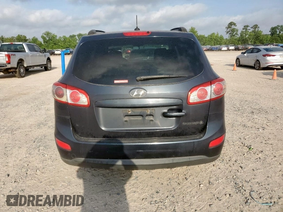2011 Hyundai Santa Fe GLS z VIN 5XYZG3AB8BG068273, wystawiony jako Copart lot #57614215 z przebiegiem 257 336 mil mil oraz Szkoda całkowita • Salvage title. Historia ofert i sprzedaży dostępna na DreamBid. Obrazek 6.