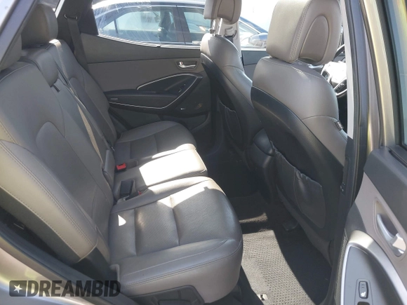2017 Hyundai Santa Fe 2.4L z VIN 5XYZU3LB4HG446961, wystawiony jako IAAI lot #42214109 z przebiegiem 140 175 mil mil oraz . Historia ofert i sprzedaży dostępna na DreamBid. Obrazek 8.